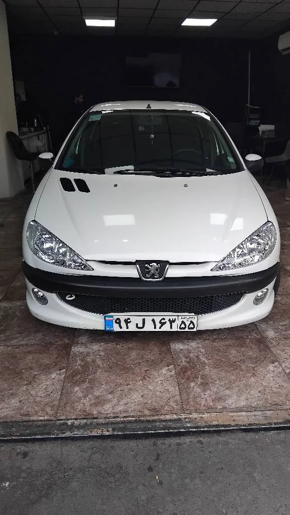 نمای 2 از خرید پژو 206 SD V20 مدل 2009-1388 مدل 2009-1388 رنگ سفید نقدی و اقساطی در خودروشاپ نمای 2 از خرید پژو 206 SD V20 مدل 2009-1388 مدل 2009-1388 رنگ سفید نقدی و اقساطی در خودروشاپ